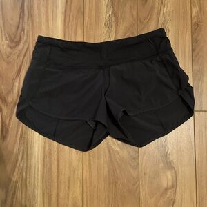 Lululemon On The Fly size 4 Black Athletic Shorts